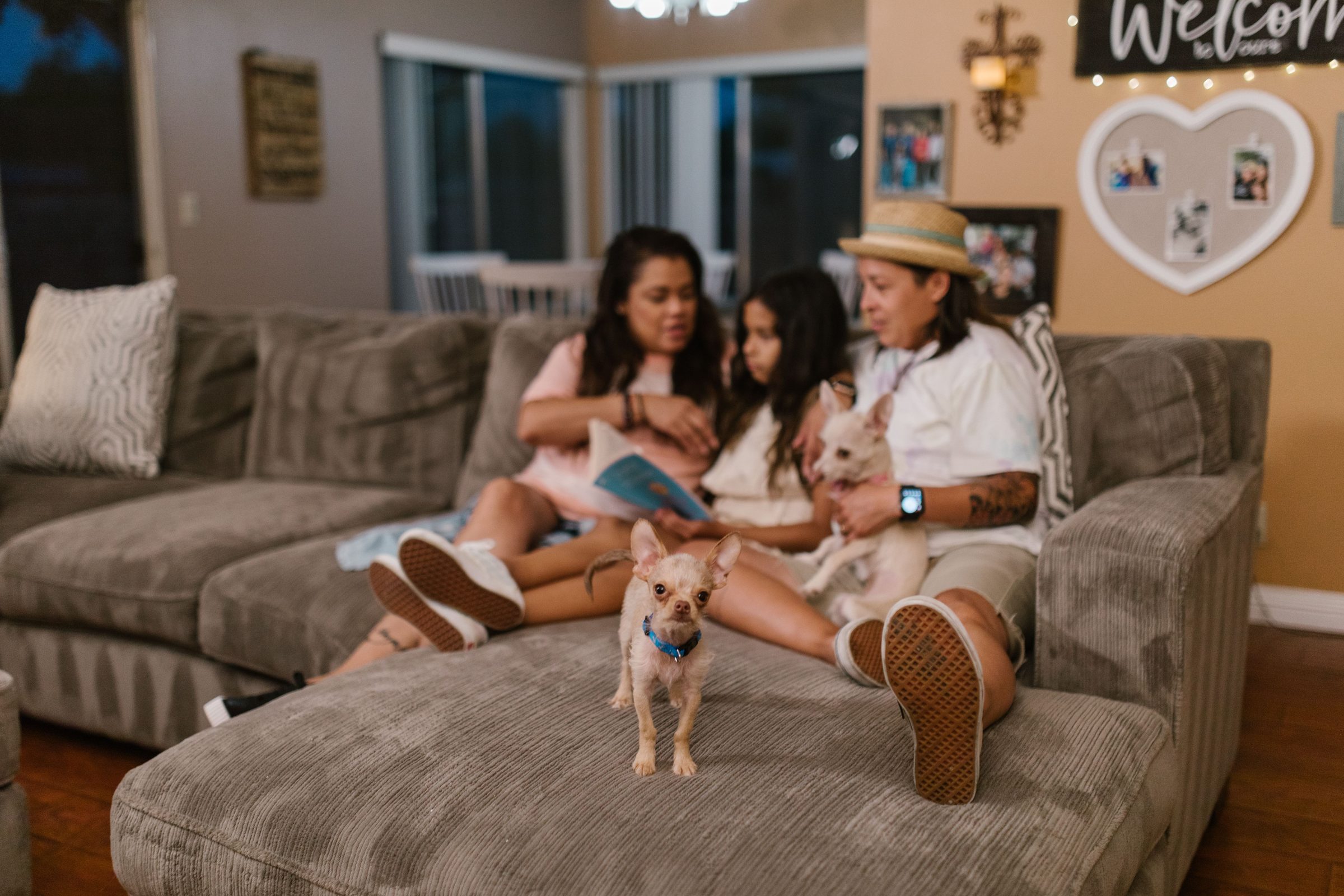 Two parents and a child spending time together at home