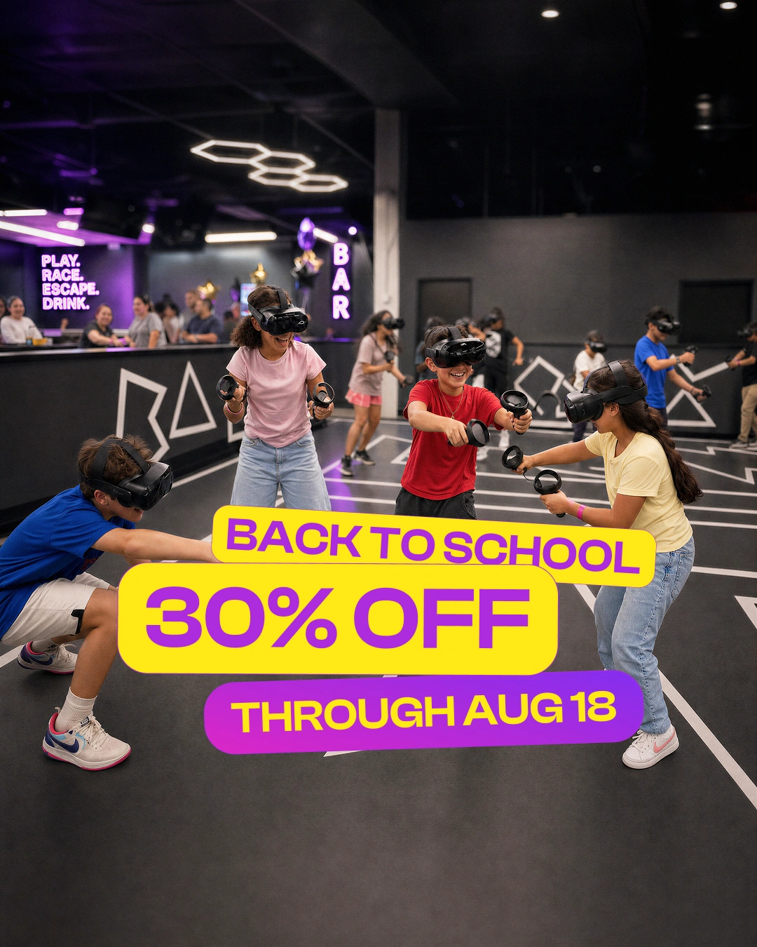 Back to school 30% off through Aug 18. Players in VR headsets in the Premium VR arena at Grid City VR in Westminster, near Denver.