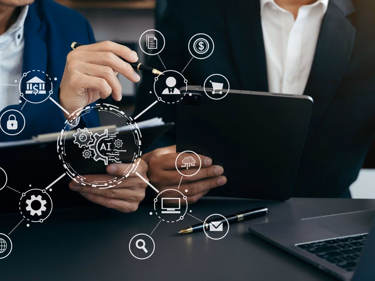Two people in the background holding pen and tablet and a different icon structure
