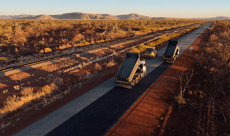 Roadform project site with completed road construction and clear blue sky in the background.