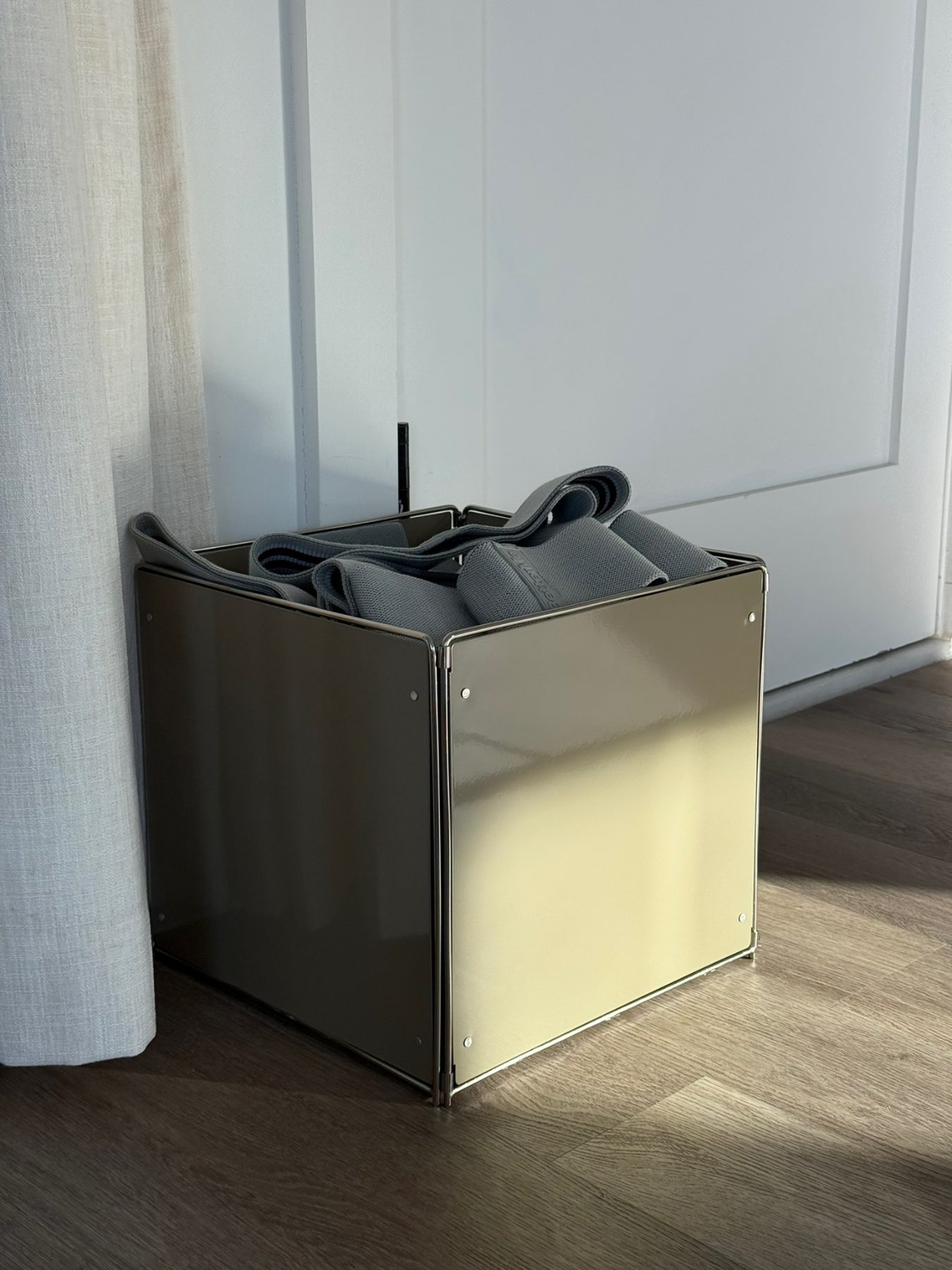 Mirrored steel box with bands