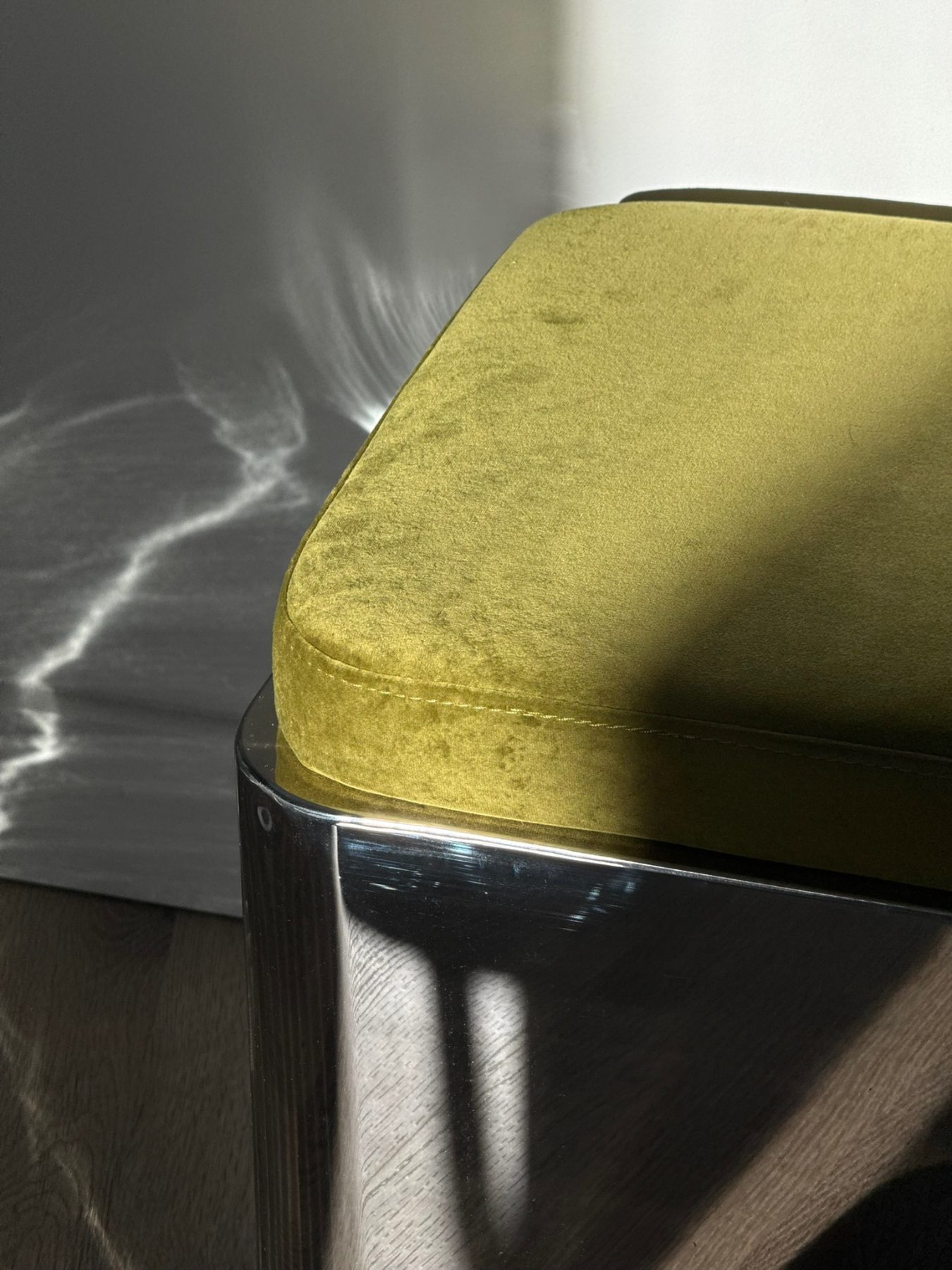 Velvet stool on steel base