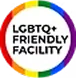 Rainbow circle with the text LGBTQ+ Friendly Facility in black letters.