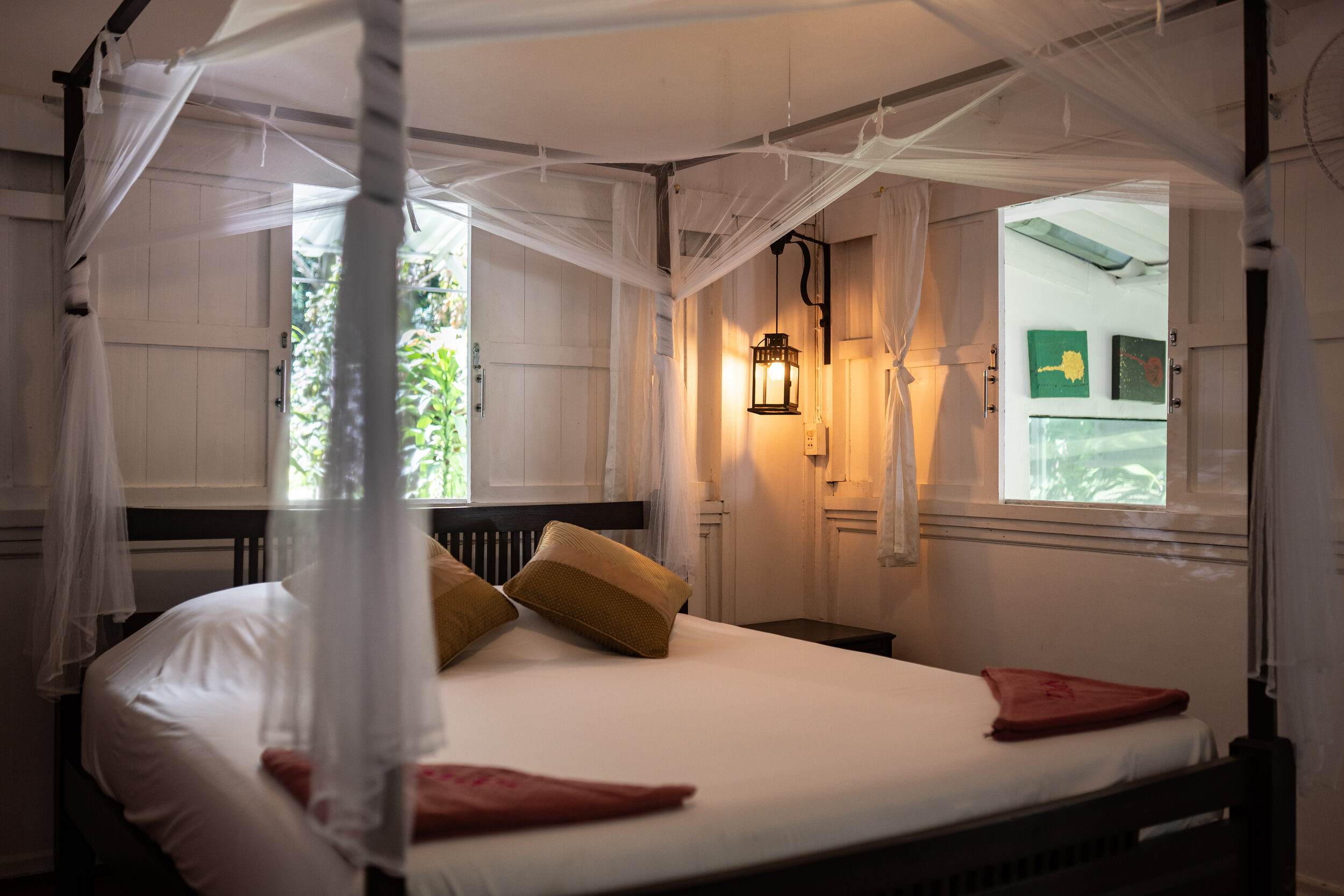 Canal House deck over the jungle — long mornings on Koh Phangan's quiet side