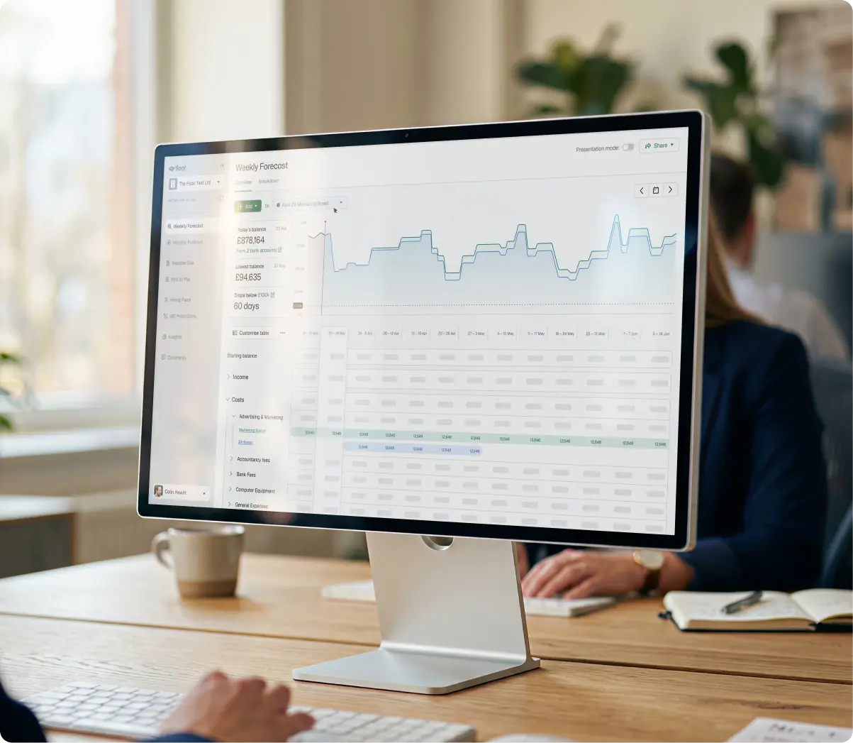 Person using Float's operating cash flow management dashboard
