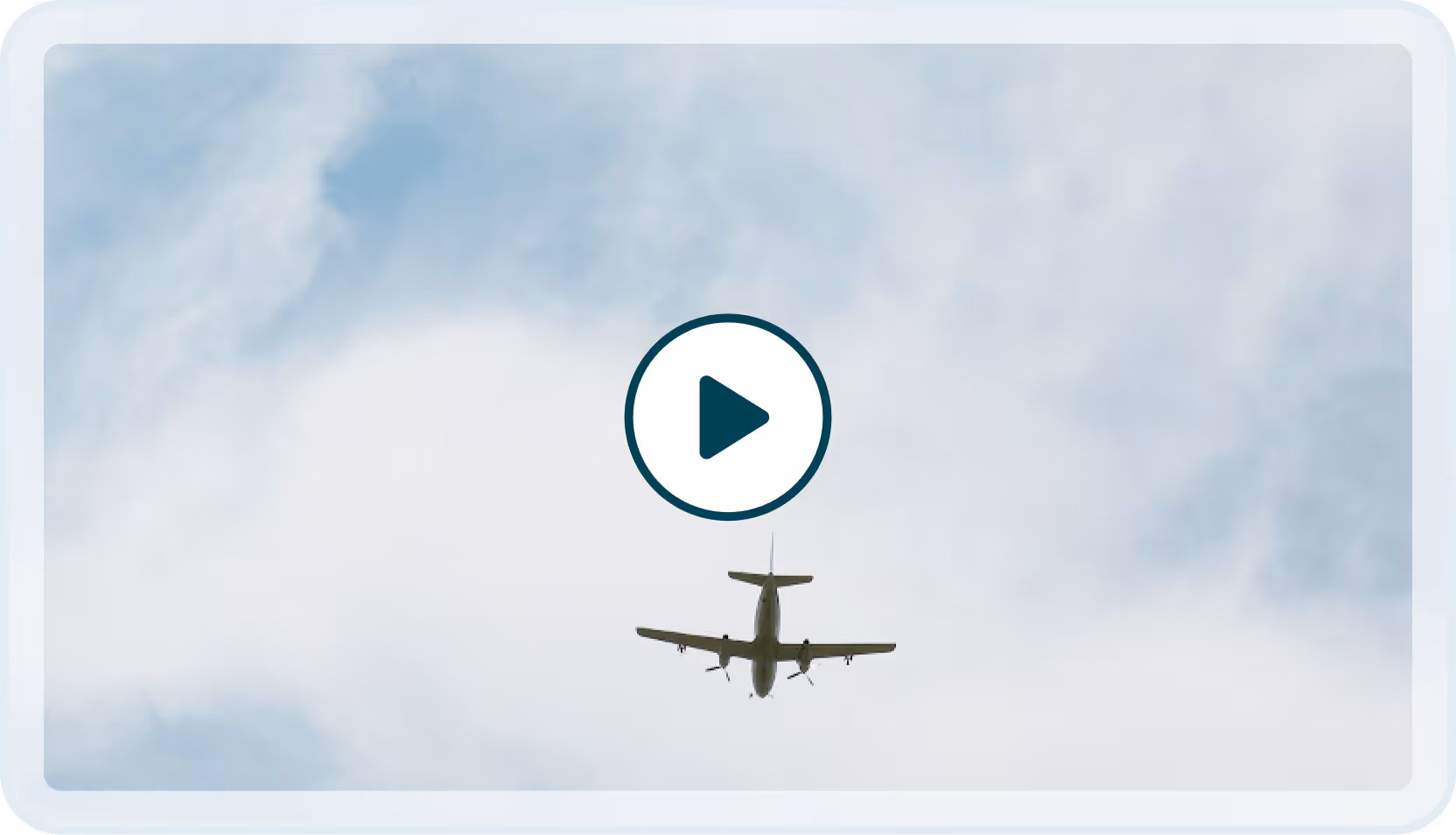 Small airplane seen from below flying against a cloudy blue sky with a play button overlay.