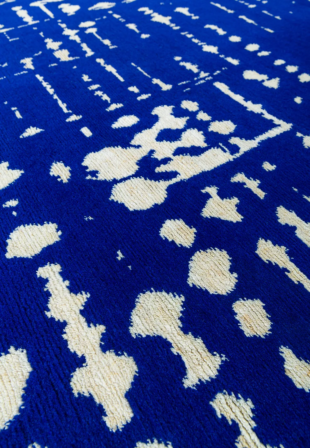 Tapis Percée Bleu, collection Sur le fil