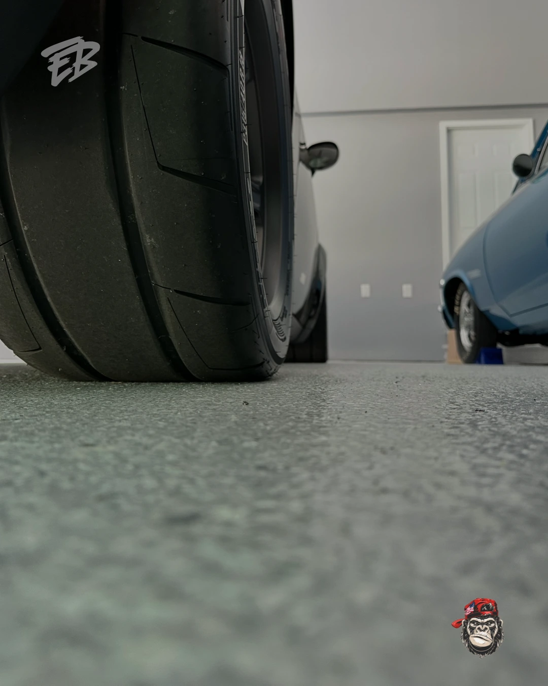 Full decorative flake broadcast being applied to a garage floor coating system in Davie Florida.