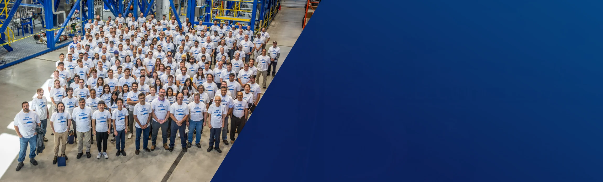 People of Zeton standing in a production hall
