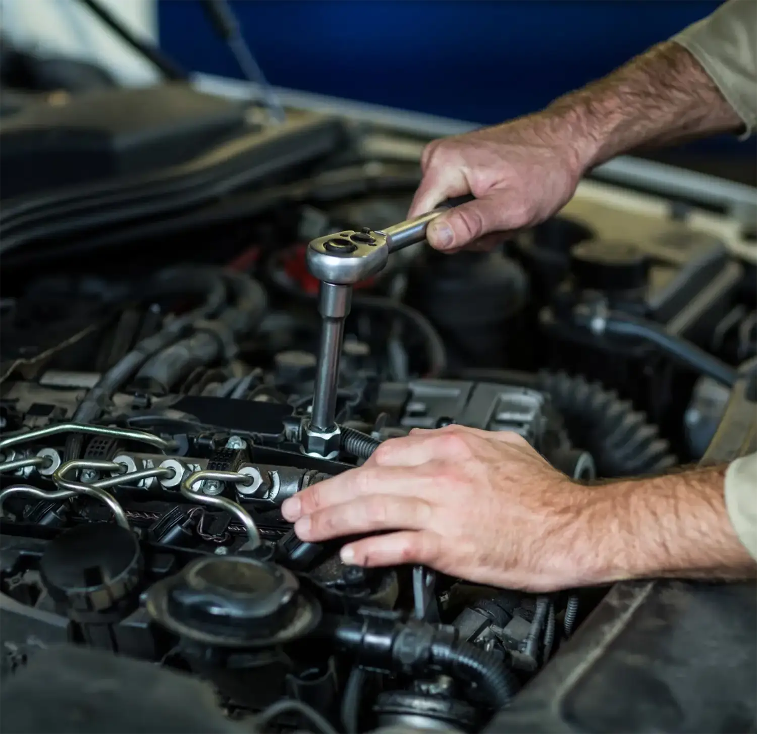 Mechanic doing a Logbook Service on a European Car