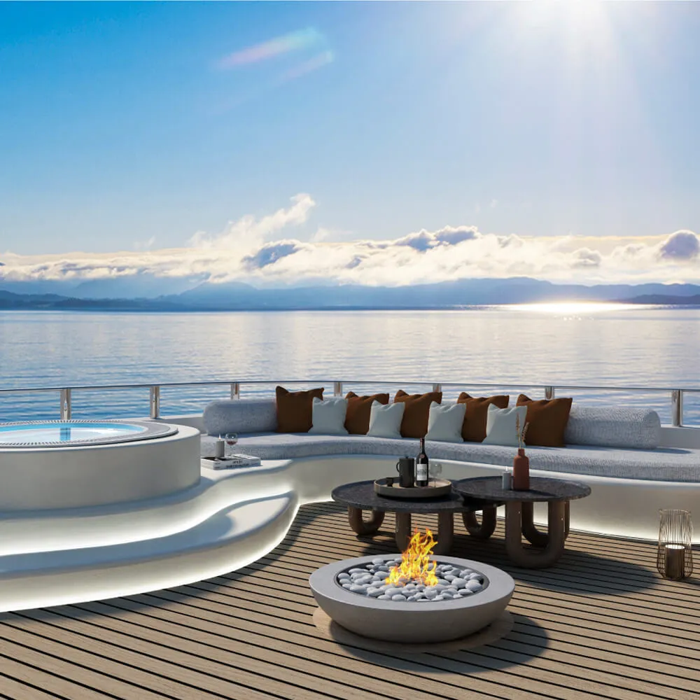 Luxury yacht interior and deck design at the Ying Yang project in Mallorca by Studio Moravová, featuring a custom fire pit, built-in jacuzzi, and a floating zen retreat layout.