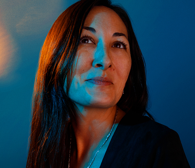 Billboard Music Awards poster with a woman's profile and a vintage microphone on a dark blue background.