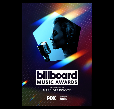 Billboard Music Awards poster with a woman's profile and a vintage microphone on a dark blue background.