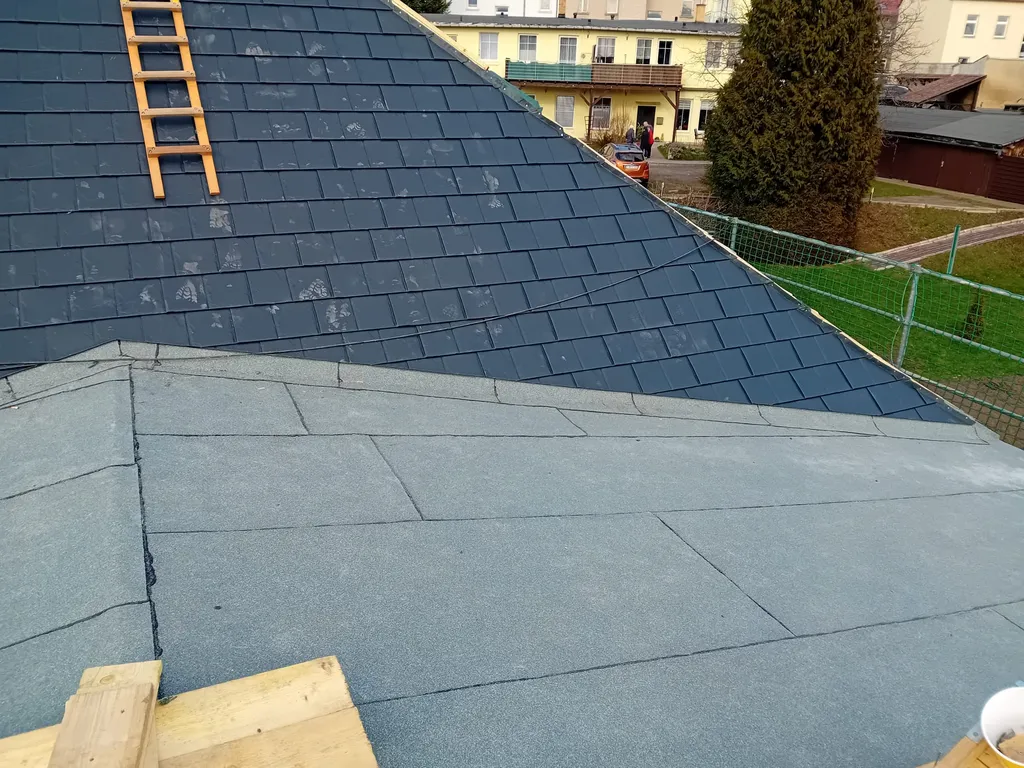 Dachsanierung mit aluminiumschindeln