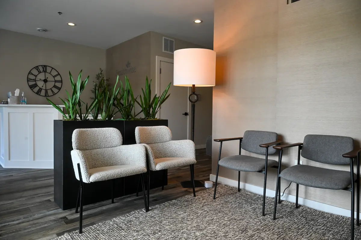Plymouth office waiting room with couches and chairs
