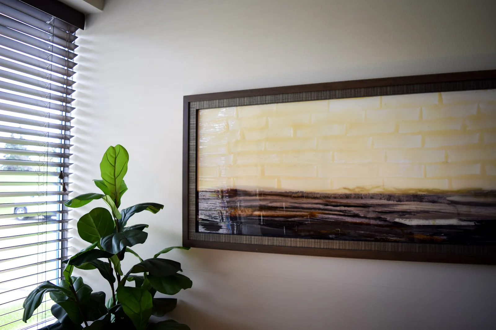 office with picture and plant