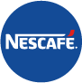 Nescafe brand logo in white text on a blue circular background.