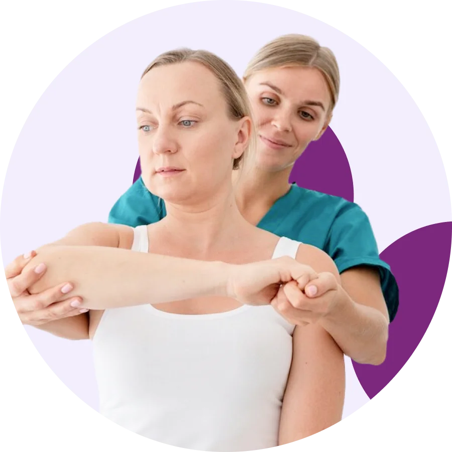 Physical therapist in teal scrubs guiding a patient through a two-arm shoulder stretch