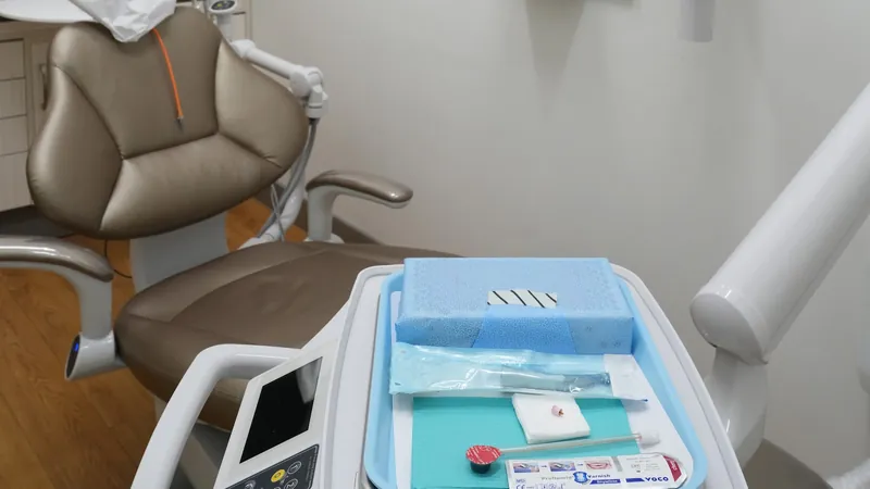 Treatment room with dental chair and checkup tray at DTC Dental Treatment Center in Richmond, BC
