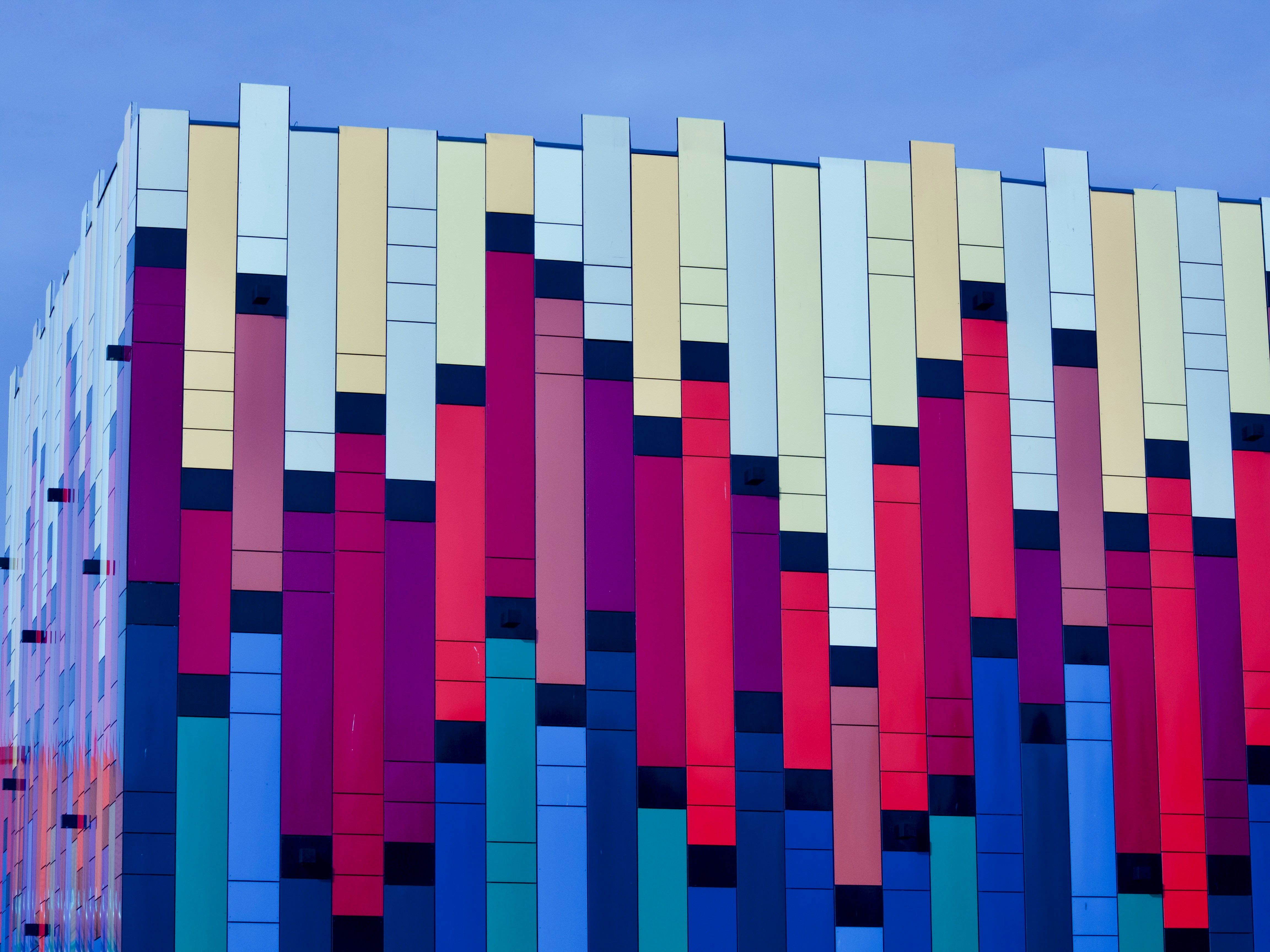 Colorful architectural facade with connected vertical panels