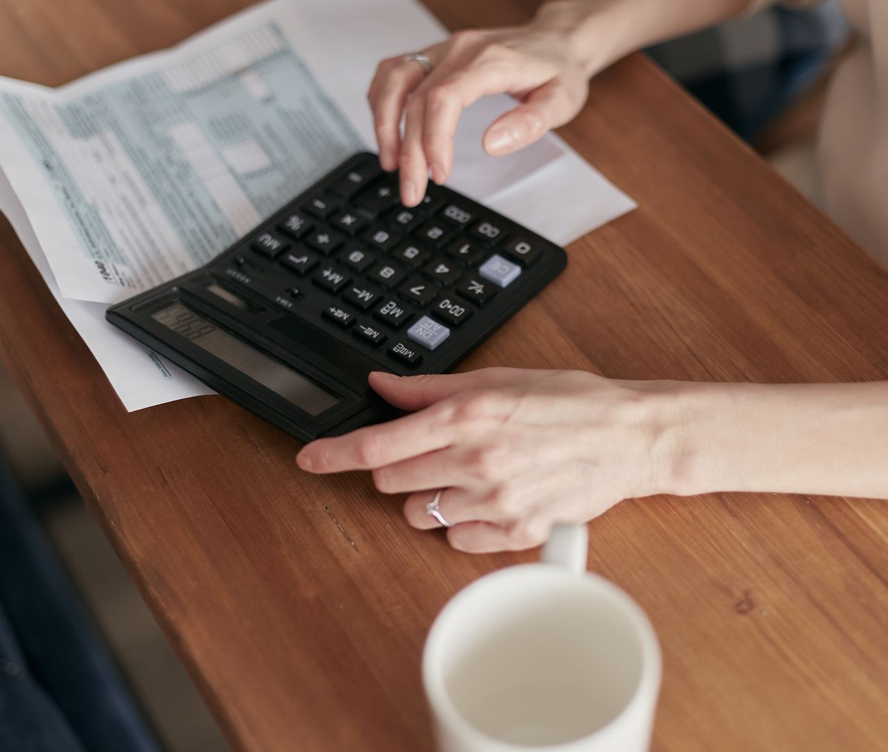 Person using a Calculator 