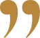 Pair of stylized gold quotation marks on a white background.
