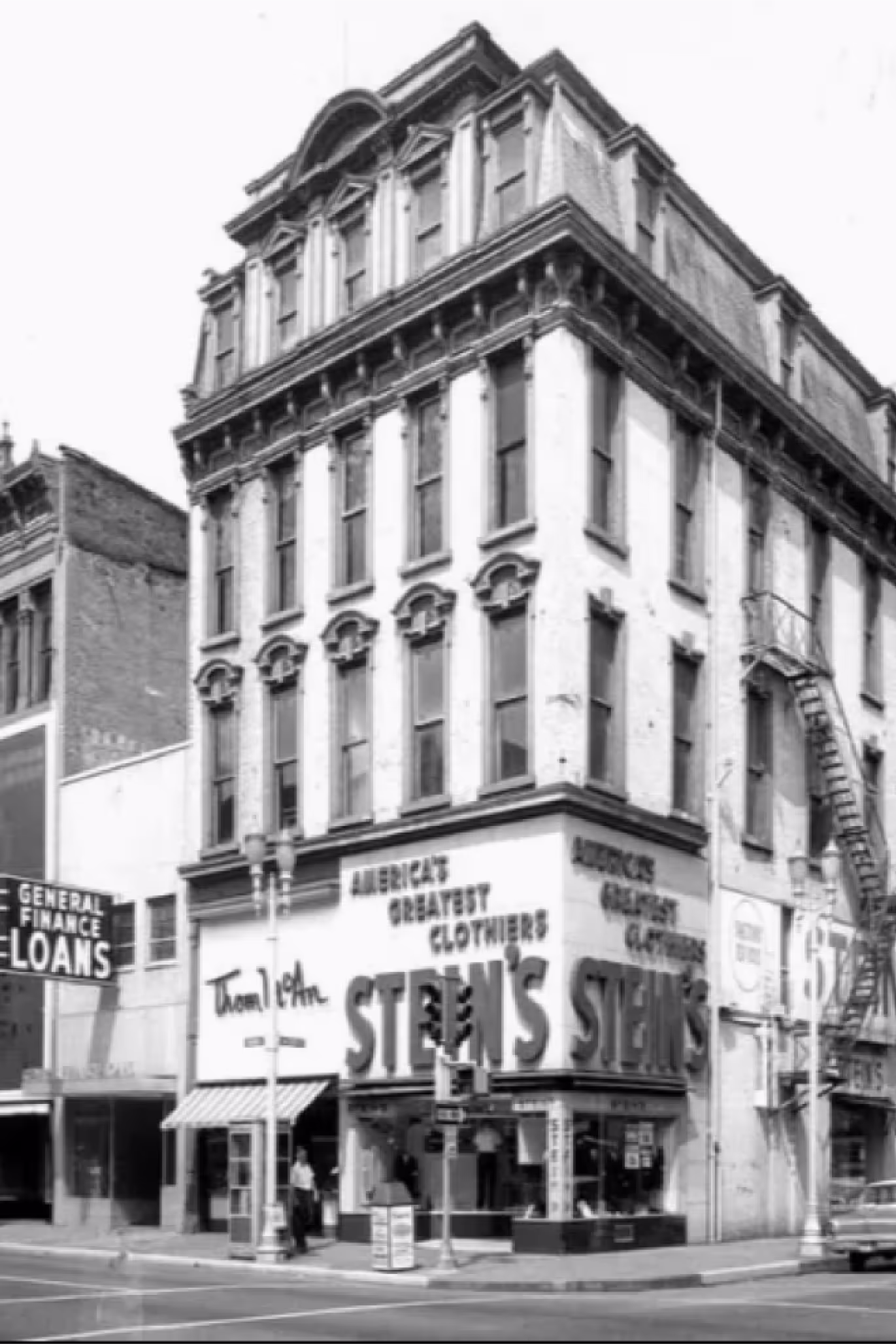A nostalgic yet warm shot of the restored historic Main Street building or a classic Southern comfort dish, conveying heritage and hospitality.