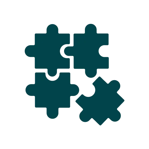 Quatre pièces de puzzle imbriquées représentant la collaboration ou la stratégie.