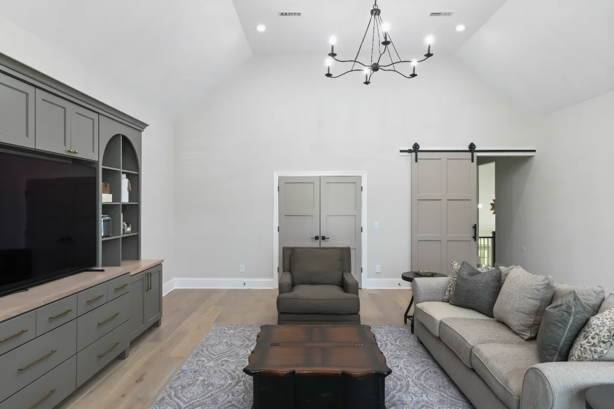 Loft remodel in Watkins Creek, TN. Sebring Design Build transformed this Watkins Creek loft in Franklin, Tennessee with River Rock and Champagne stain cabinetry, Duchateau The Guild Kayla 7.