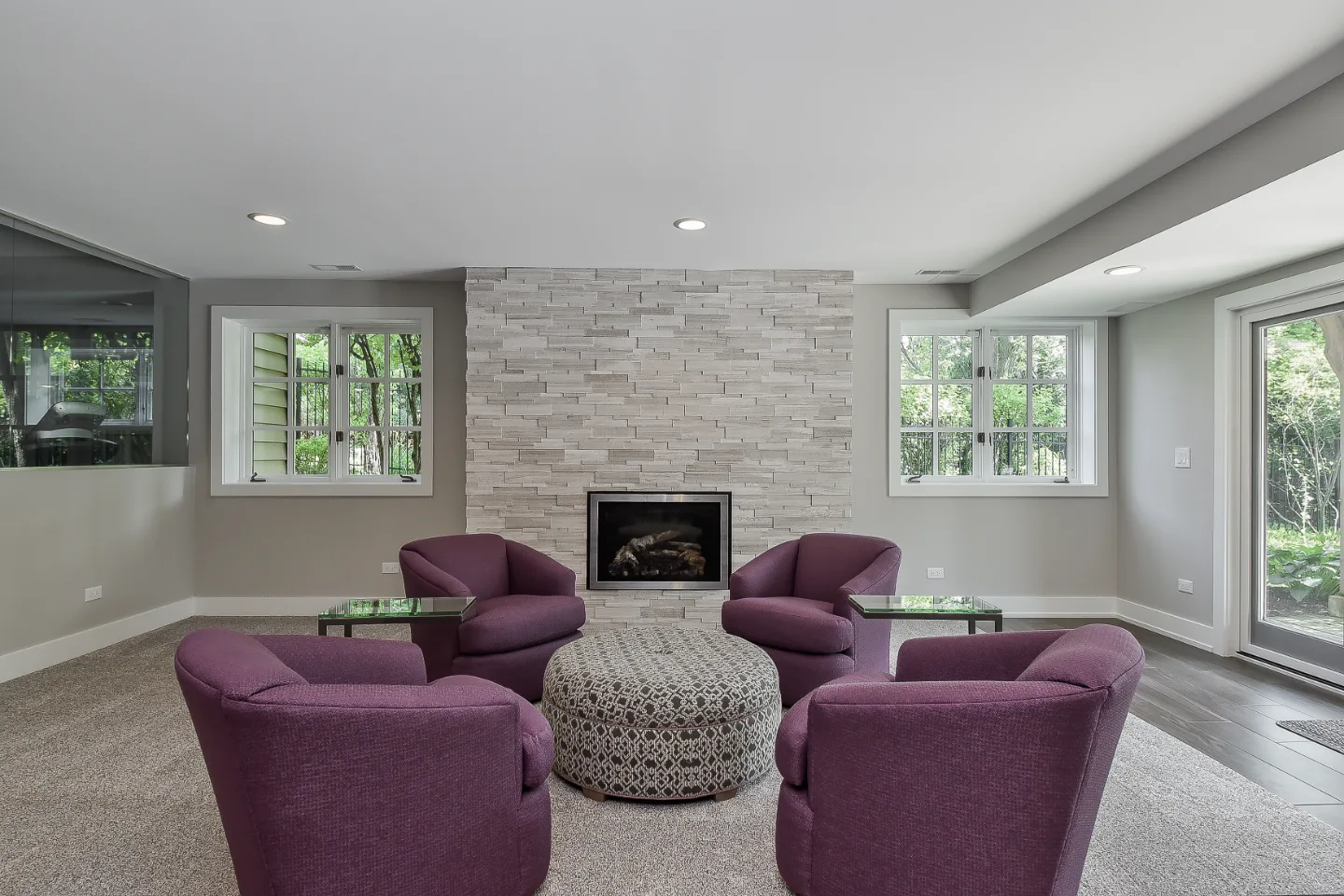 Basement remodel in Franklin, TN. Sebring Design Build finished this Franklin, Tennessee basement as a multi-zone functional-modern lower level with a main living area, gym, wet bar, guest bath, and workshop.