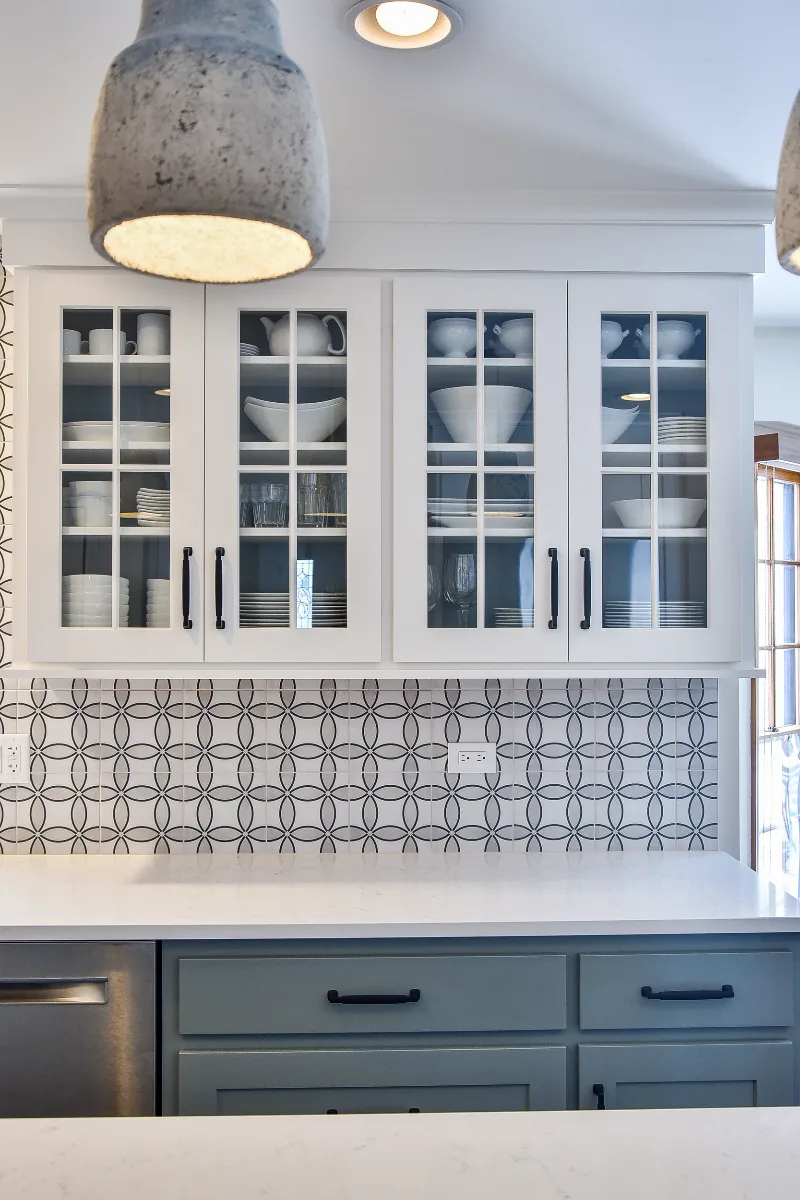 Kitchen remodel in Franklin, TN. Sebring Design Build transformed this Franklin, Tennessee kitchen with CWP Craftsman Recessed Square cabinetry in Puget Sound bases and island and Soft White uppers.
