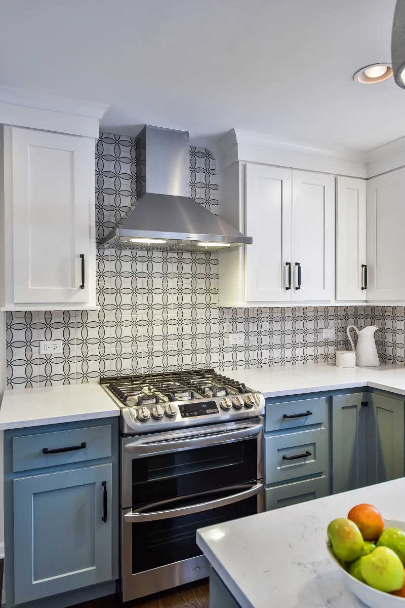 Kitchen remodel in Franklin, TN. Sebring Design Build transformed this Franklin, Tennessee kitchen with CWP Craftsman Recessed Square cabinetry in Puget Sound bases and island and Soft White uppers.