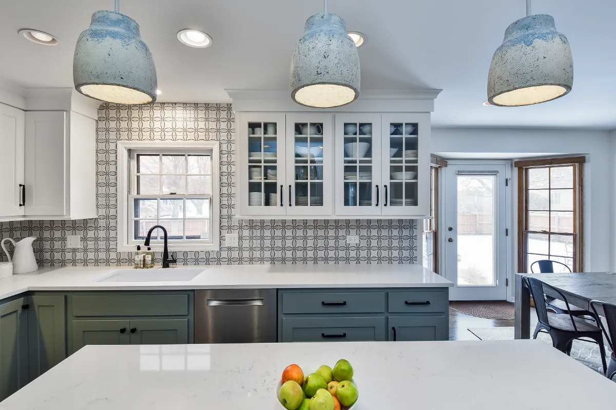 Kitchen remodel in Franklin, TN. Sebring Design Build transformed this Franklin, Tennessee kitchen with CWP Craftsman Recessed Square cabinetry in Puget Sound bases and island and Soft White uppers.