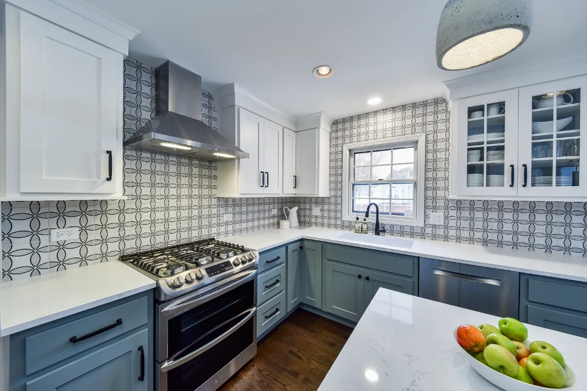 Kitchen remodel in Franklin, TN. Sebring Design Build transformed this Franklin, Tennessee kitchen with CWP Craftsman Recessed Square cabinetry in Puget Sound bases and island and Soft White uppers.
