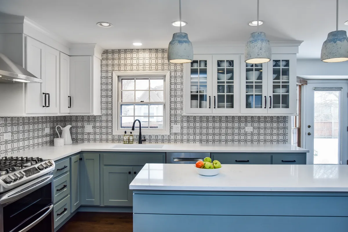 Kitchen remodel in Franklin, TN. Sebring Design Build transformed this Franklin, Tennessee kitchen with CWP Craftsman Recessed Square cabinetry in Puget Sound bases and island and Soft White uppers.