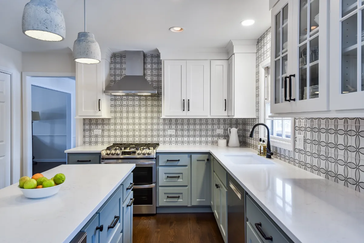 Kitchen remodel in Franklin, TN. Sebring Design Build transformed this Franklin, Tennessee kitchen with CWP Craftsman Recessed Square cabinetry in Puget Sound bases and island and Soft White uppers.