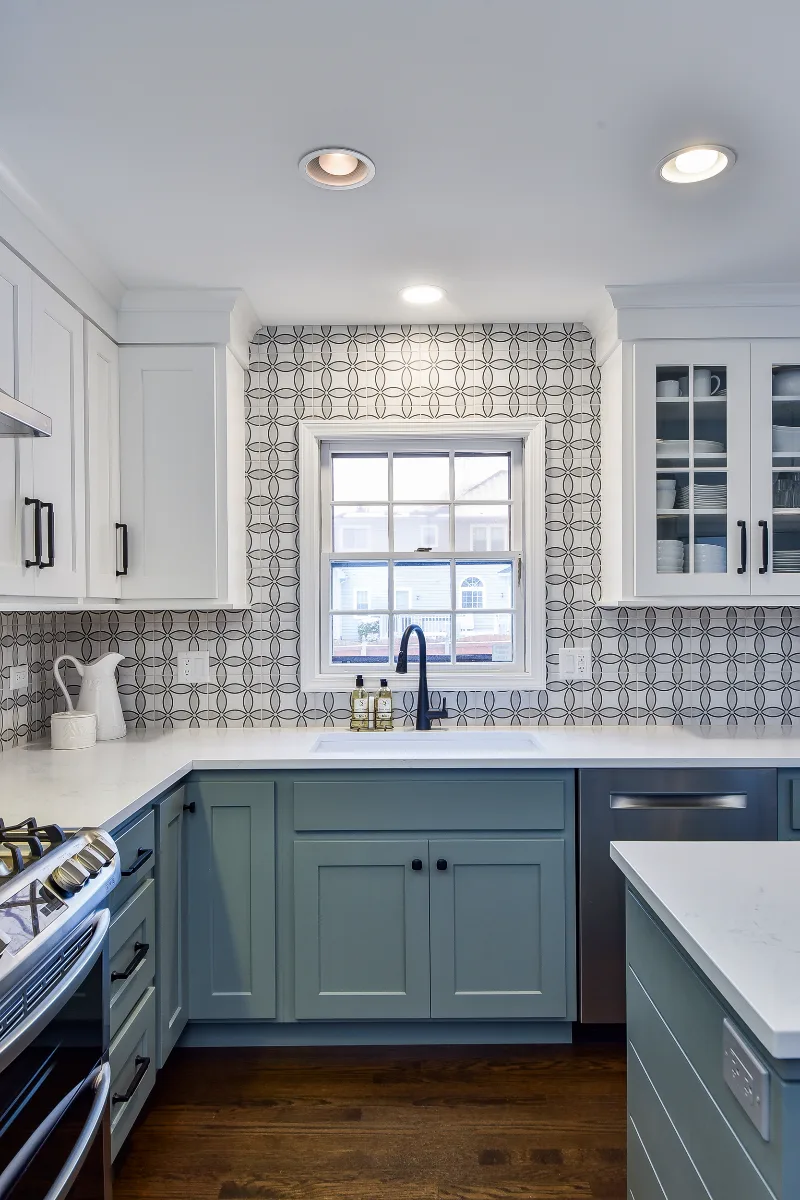 Kitchen remodel in Franklin, TN. Sebring Design Build transformed this Franklin, Tennessee kitchen with CWP Craftsman Recessed Square cabinetry in Puget Sound bases and island and Soft White uppers.
