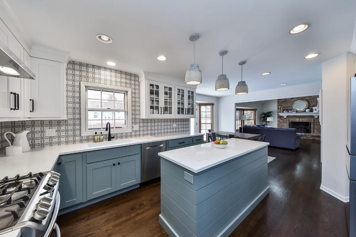 Kitchen remodel in Franklin, TN. Sebring Design Build transformed this Franklin, Tennessee kitchen with CWP Craftsman Recessed Square cabinetry in Puget Sound bases and island and Soft White uppers.