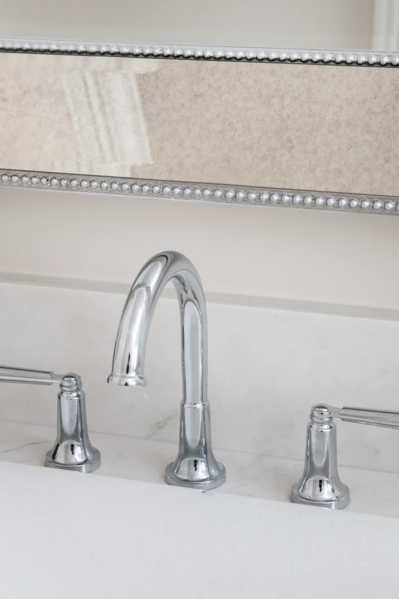 Primary Bath remodel in Cool Springs, TN. Sebring Design Build transformed this Cool Springs primary bath in Franklin, Tennessee with Shaker Recessed Square Dune cabinetry, Metro Quartz Mystique Square Edge countertops.