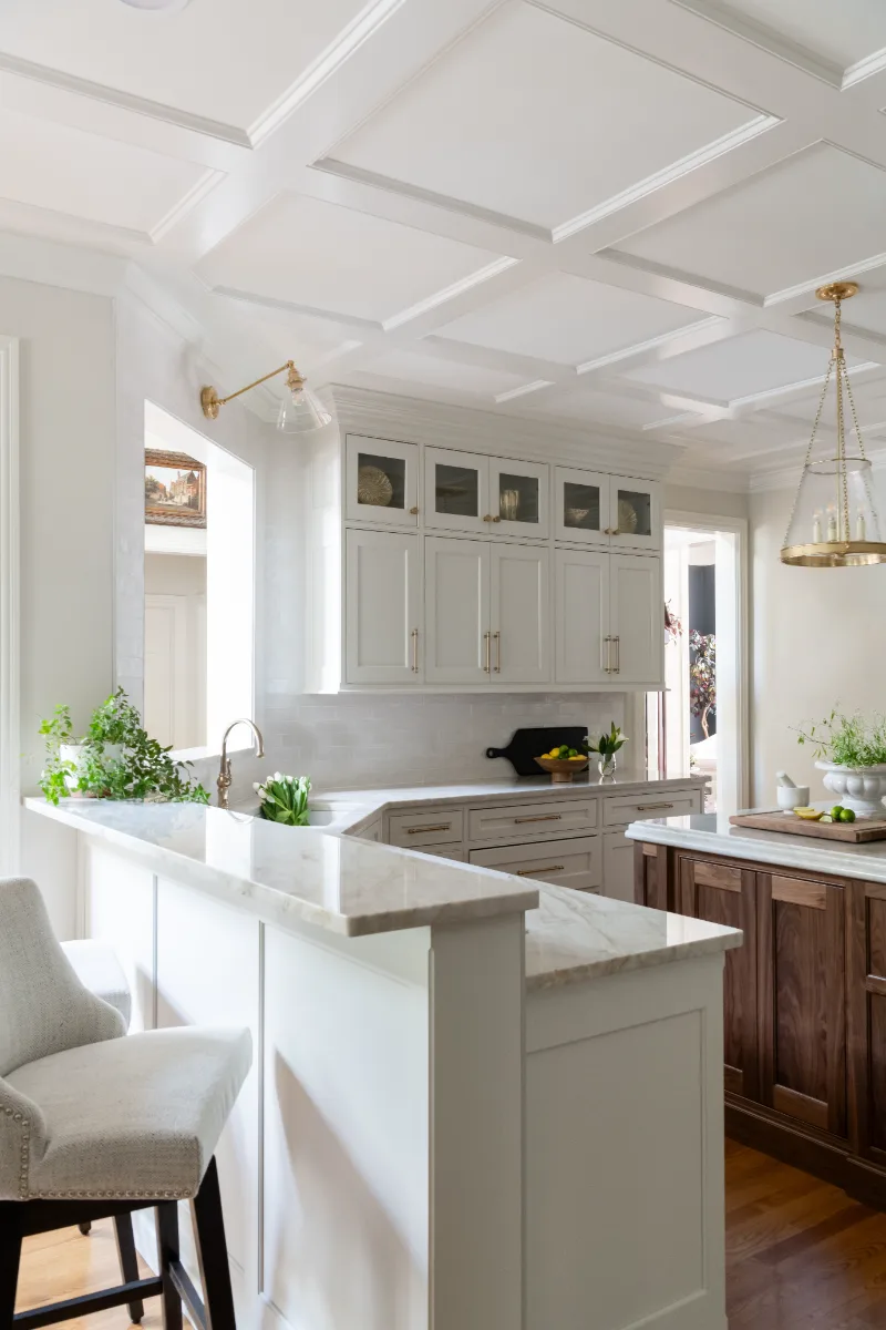 Kitchen remodel in Cool Springs, TN. Sebring Design Build transformed this Cool Springs kitchen in Franklin, Tennessee with Havana Square Recessed MDF Panel soft white cabinetry.