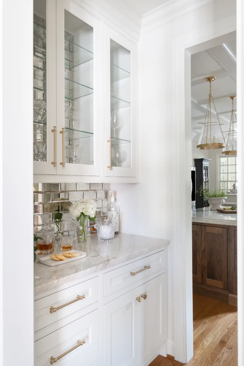 Kitchen remodel in Cool Springs, TN. Sebring Design Build transformed this Cool Springs kitchen in Franklin, Tennessee with Havana Square Recessed MDF Panel soft white cabinetry.