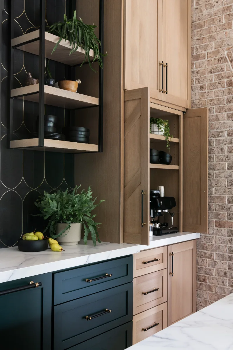 Kitchen remodel in Columbia, TN. Sebring Design Build transformed this Columbia, Tennessee kitchen with CWP Shaker Recessed cabinetry in Sherwin Williams Jasper, a White Oak Champagne Matte island and coffee bar.