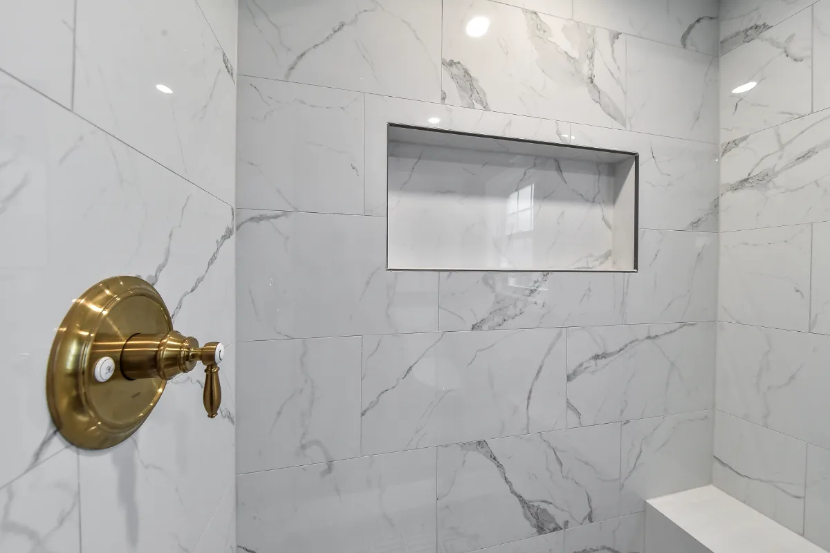 Guest Bath remodel in Brentwood, TN. Sebring Design Build transformed this Brentwood, Tennessee guest bath with CWP Havana Square Recessed Pearl cabinetry, Hanstone Yorkville polished quartz.