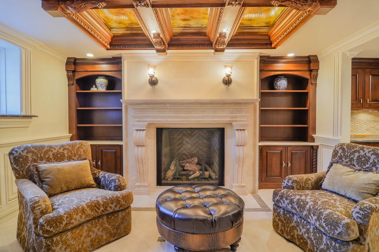 Living Room remodel in Franklin, TN. Sebring Design Build designed this Franklin, Tennessee basement living room as part of a traditional-intricate basement remodel featuring coffered ceilings, custom built-ins.