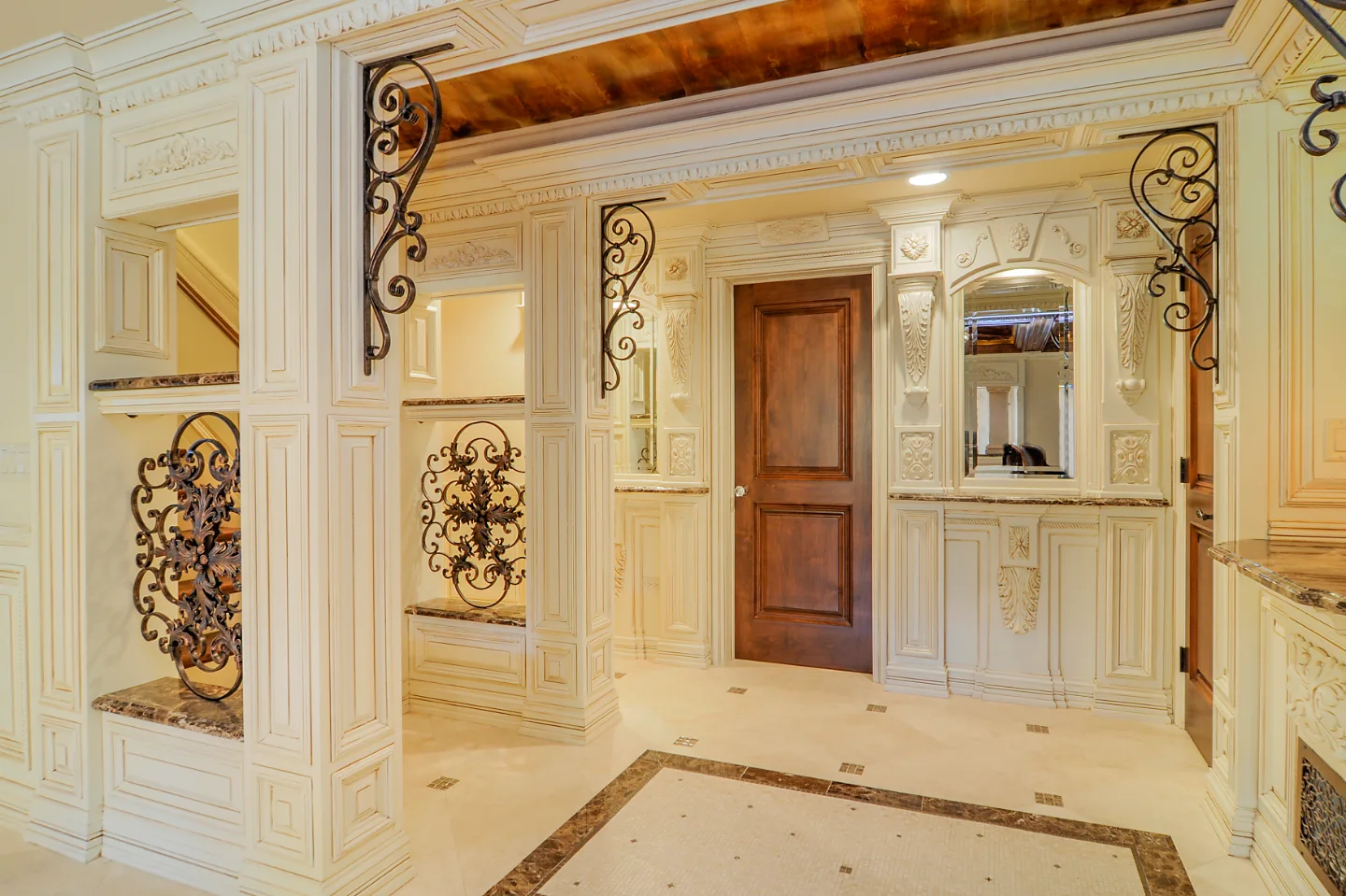 Basement remodel in Franklin, TN. Sebring Design Build transformed this Franklin, Tennessee basement into a traditional-intricate entertaining level with a coffered ceiling featuring rich wood finishes.