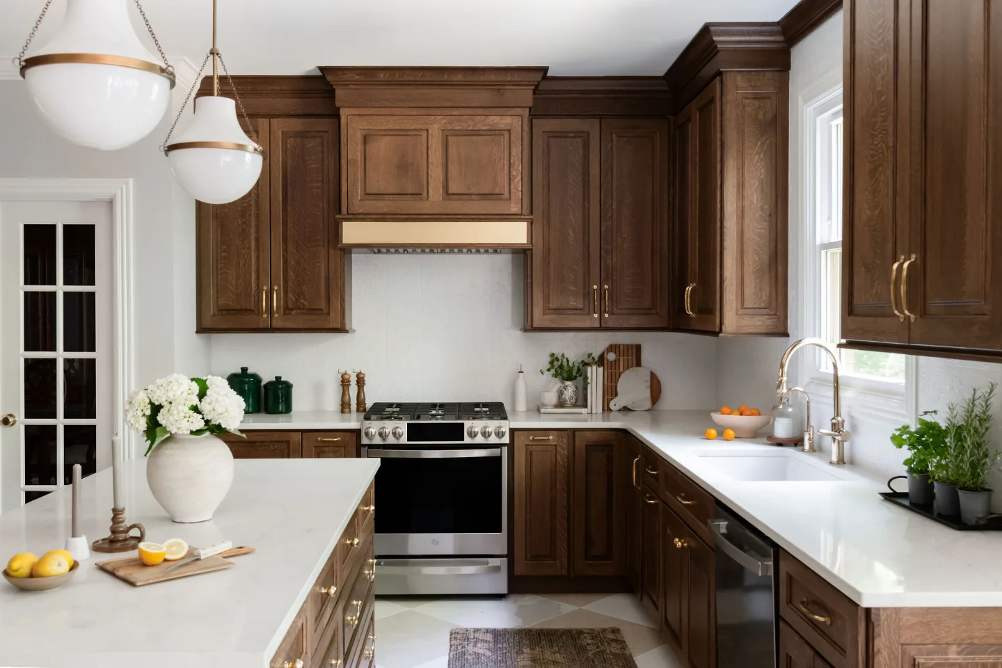 Kitchen remodel in Chenoweth, TN. Sebring Design Build transformed this Chenoweth kitchen in Brentwood, Tennessee with CWP Classic Square Raised Solid Wood Panel White Oak Coffee Marginal Overlay cabinetry.