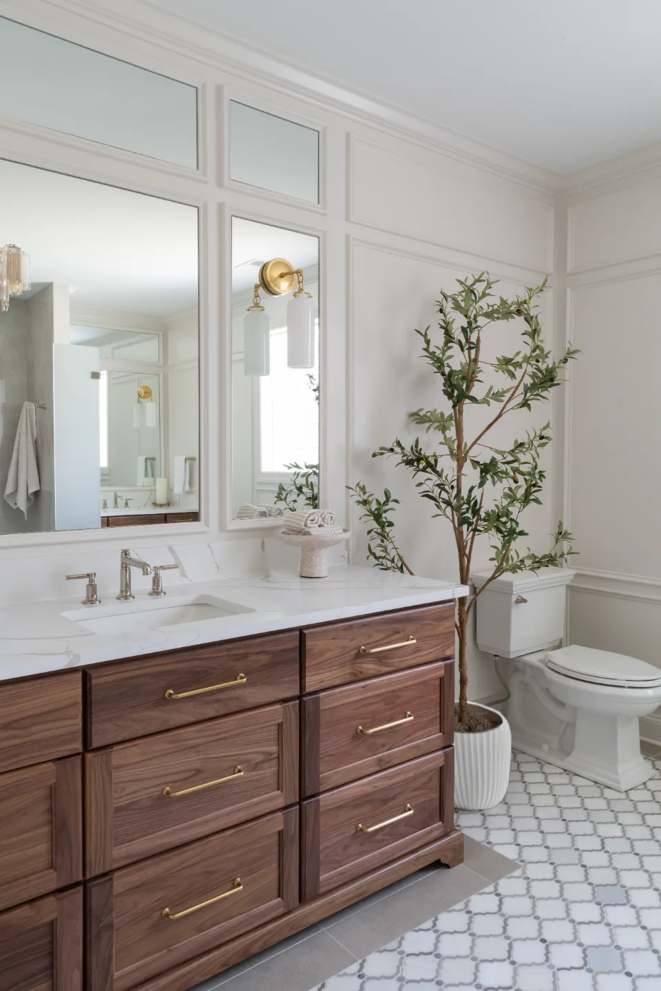 Primary Bath remodel in Willowsprings, TN. Sebring Design Build transformed this Willowsprings primary bath in Franklin, Tennessee with CWP Classic Square Recessed Solid Wood Panel Walnut Natural Marginal Overlay cabinetry.