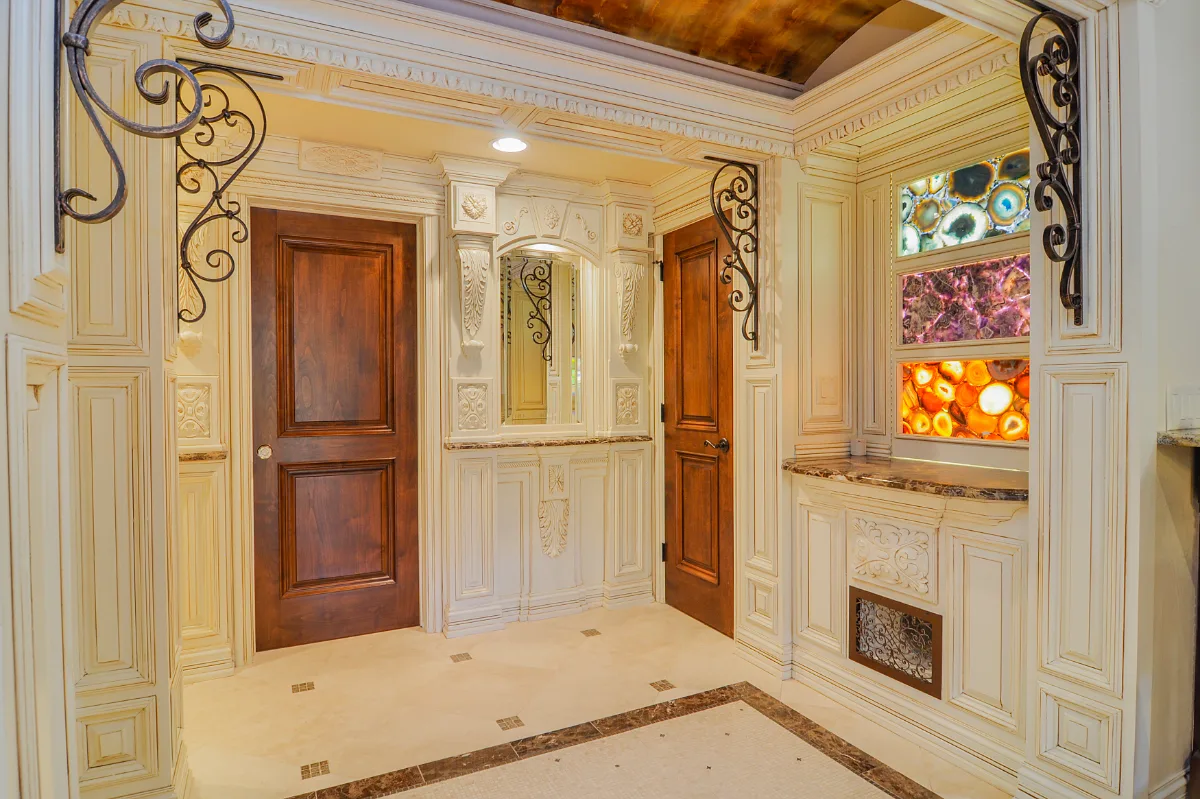 Basement remodel in Franklin, TN. Sebring Design Build transformed this Franklin, Tennessee basement into a traditional-intricate entertaining level with a coffered ceiling featuring rich wood finishes.