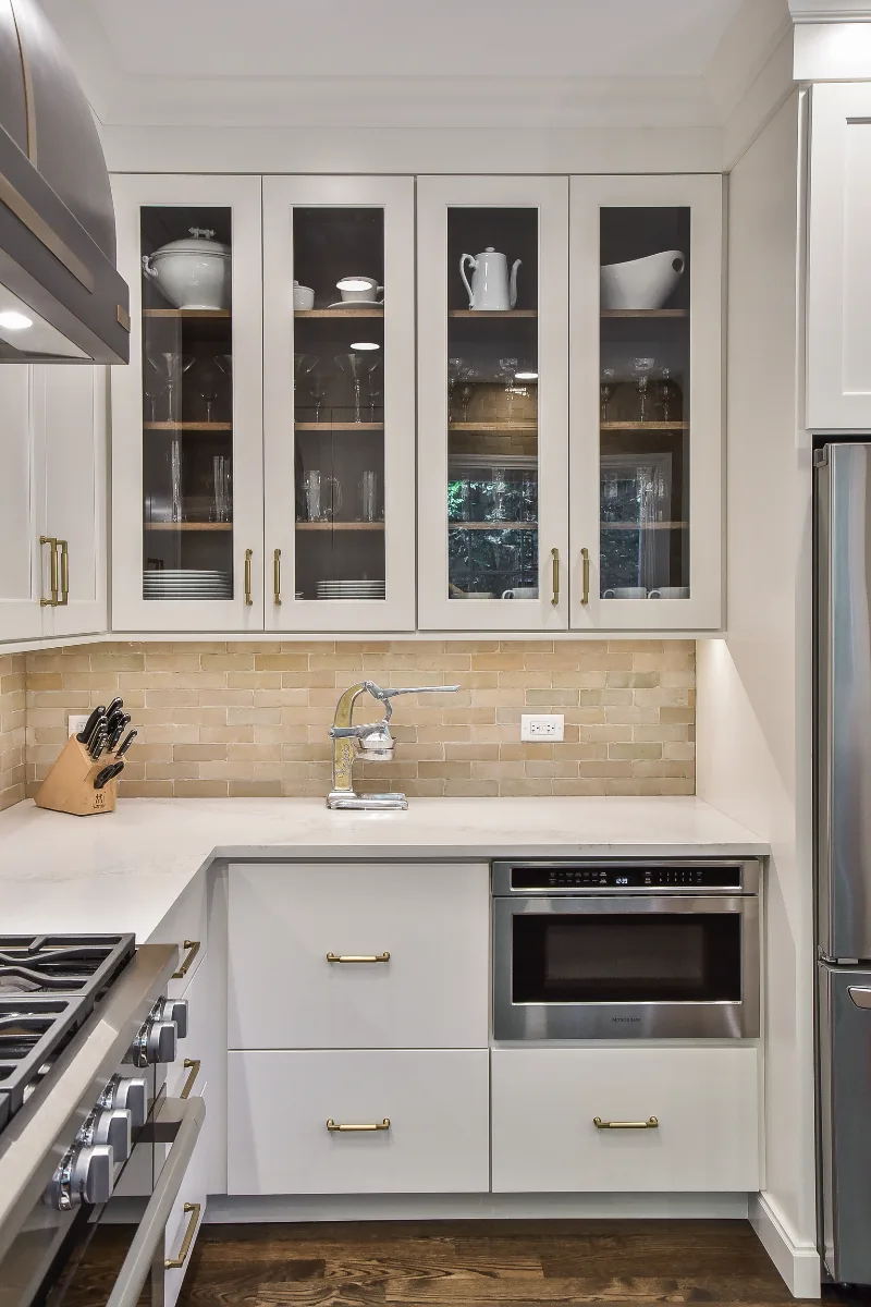 Kitchen remodel in Brentwood, TN. Sebring Design Build transformed this Brentwood kitchen by removing angled walls and soffits to create an open.