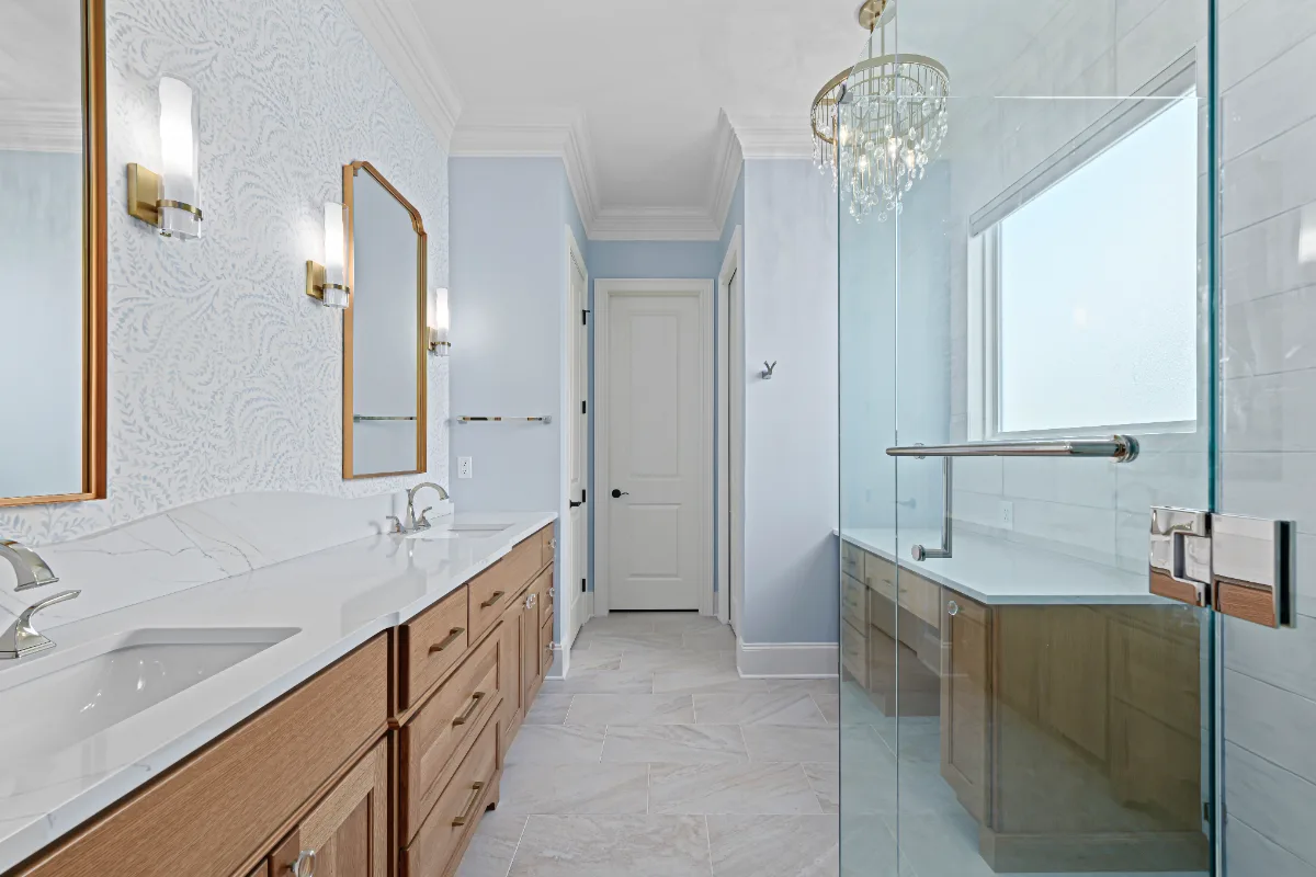 A modern-crisp-elegant primary bath in Westhaven, Franklin TN 37064. CWP Quartersawn White Oak Sage cabinetry, MetroQuartz Calacatta Gold, Brizo Virage Polished Nickel, MLW Sedona White walls, and Adex Habitat River Blue Glossy accent tile by.
